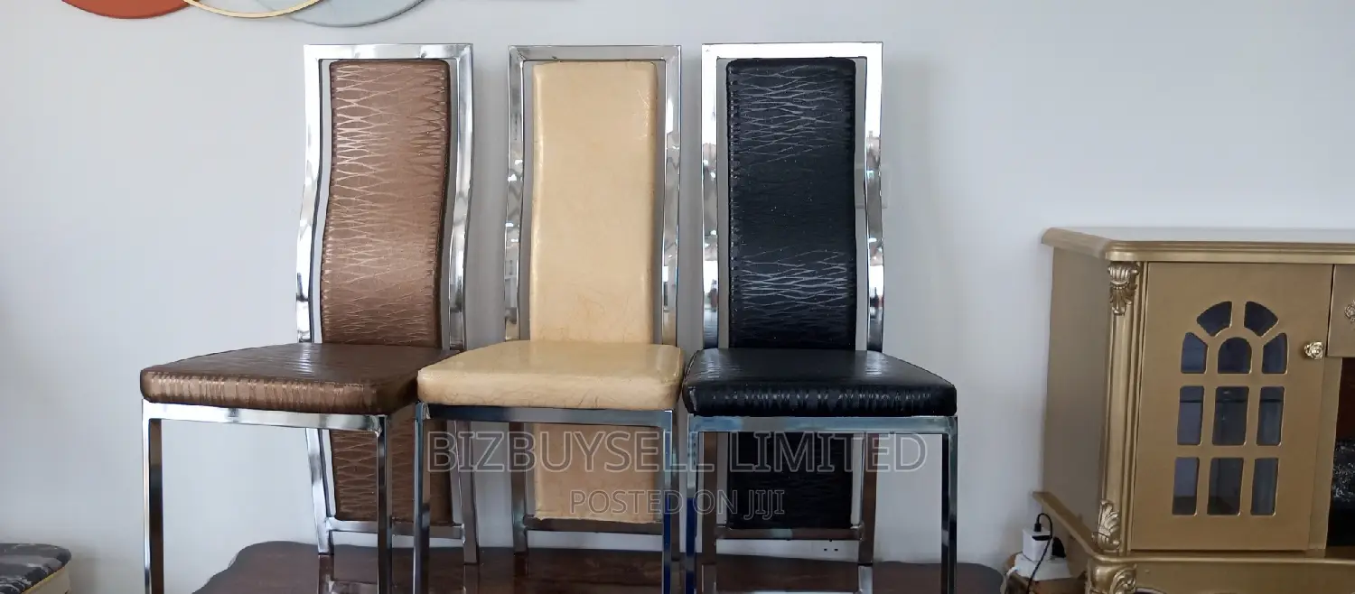 Dinning Chair With Stanlless Legs.
