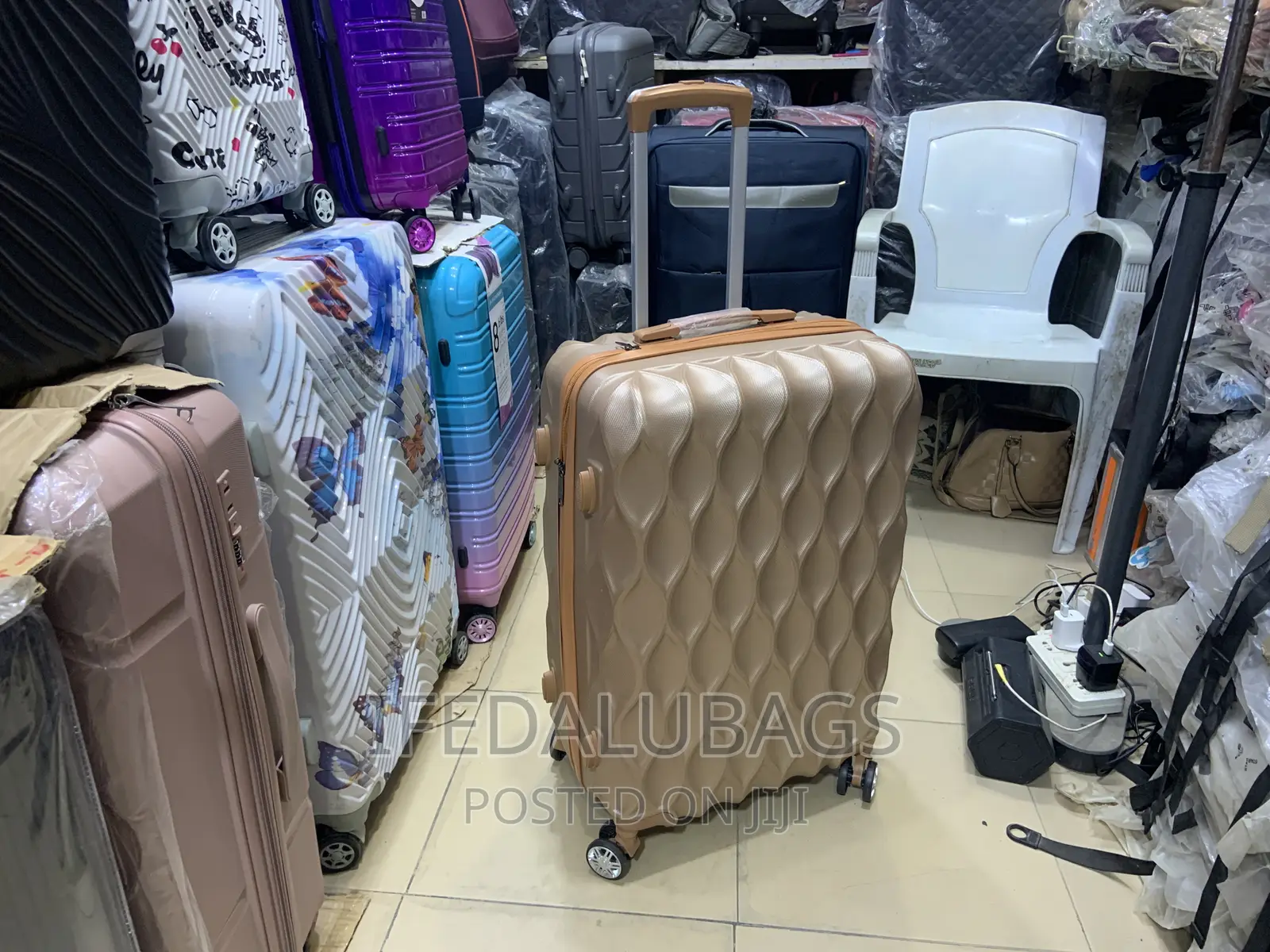 Medium Size Gold Colour Plastic Travel Luggage