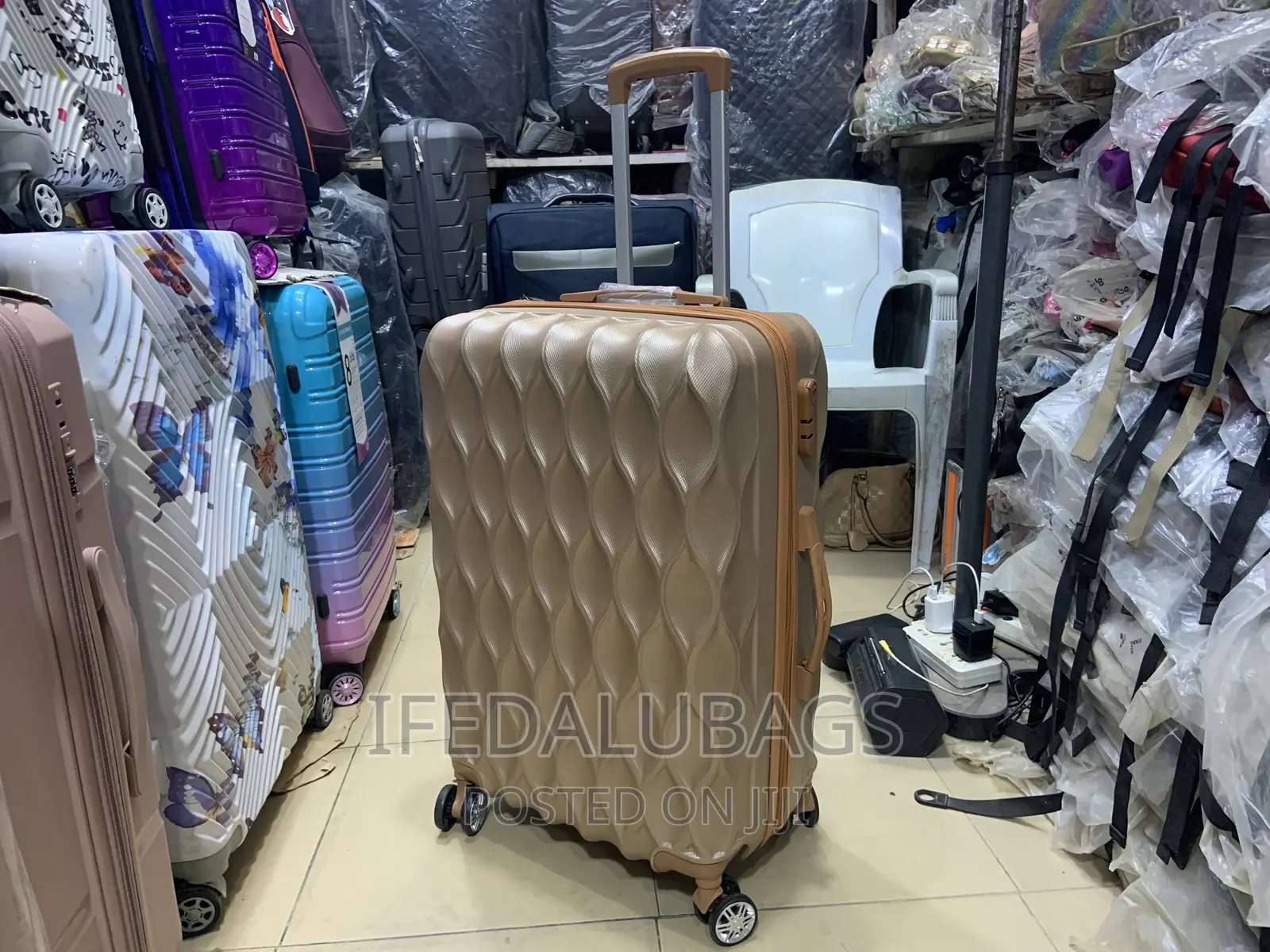 Medium Size Gold Colour Plastic Travel Luggage