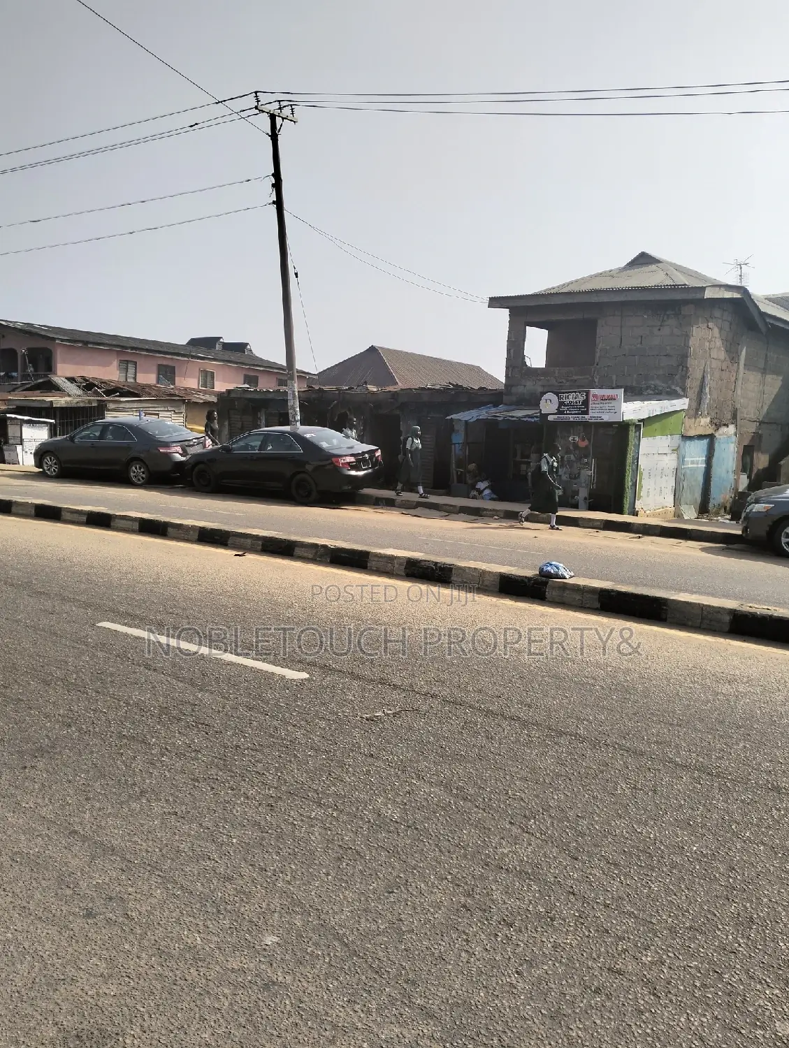 A Commercial Full Plot of Land Along the Major Rd at Igando