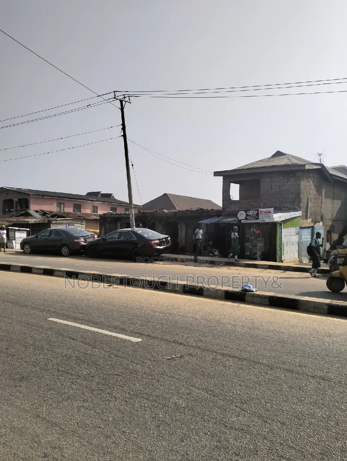 A Commercial Full Plot of Land Along the Major Rd at Igando