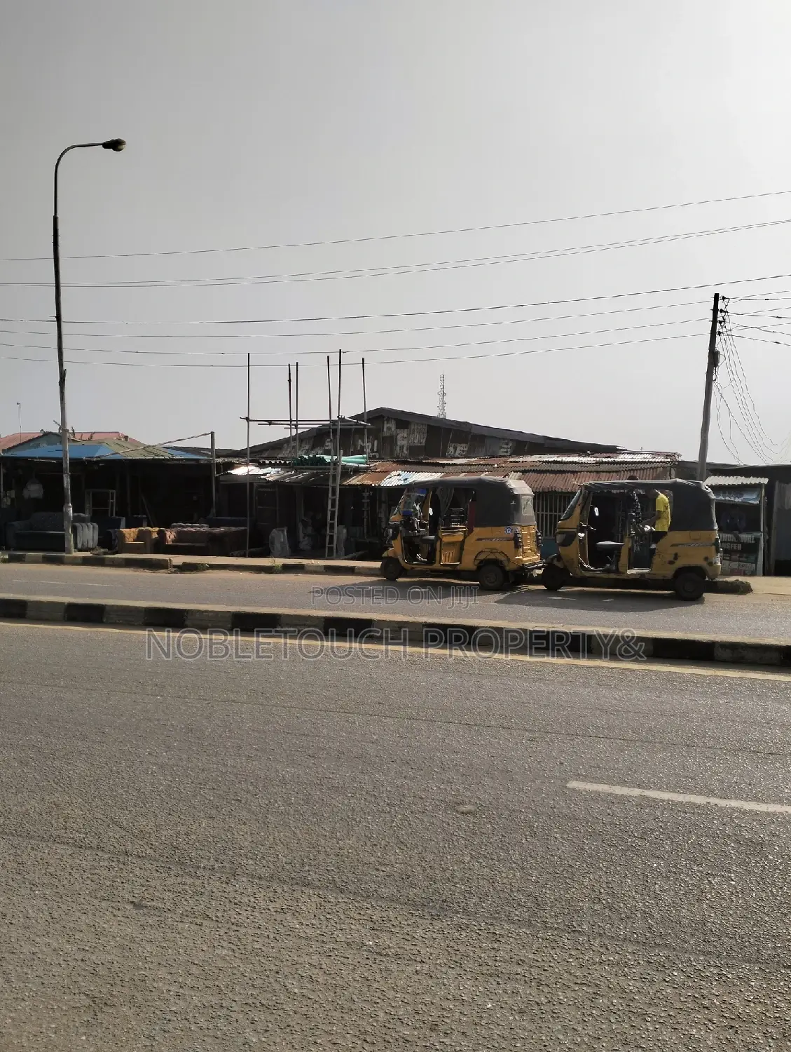 Commercial Building With Enough Shops Along the Major Road