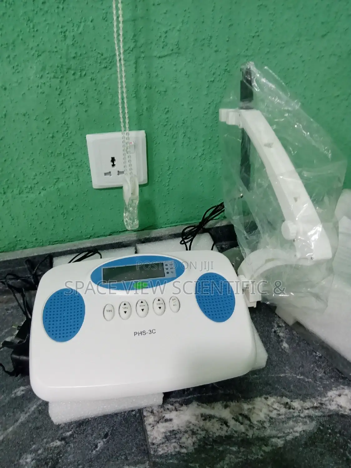 Ph Meter and the Prode With the Solution.