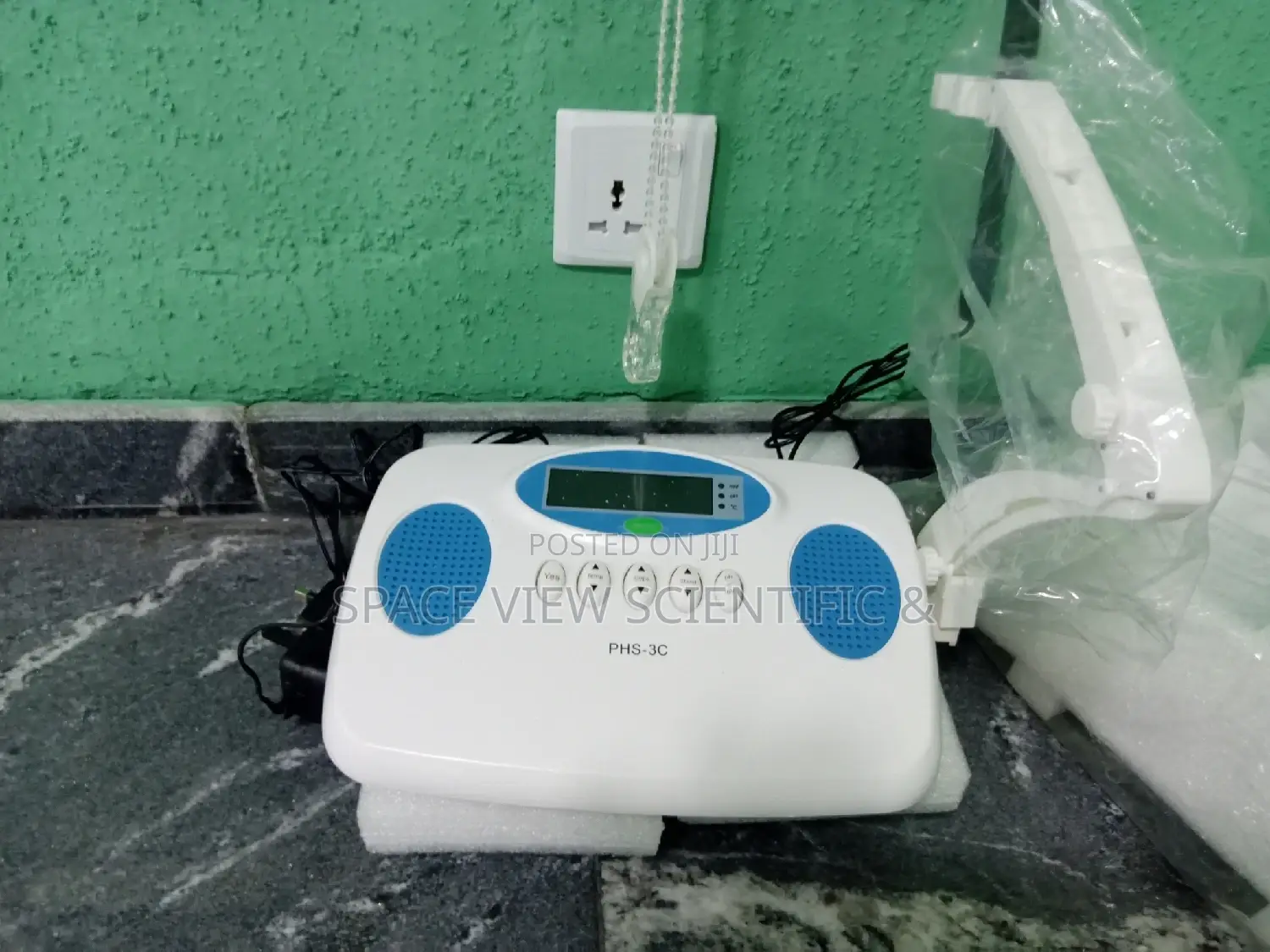Ph Meter and the Prode With the Solution.