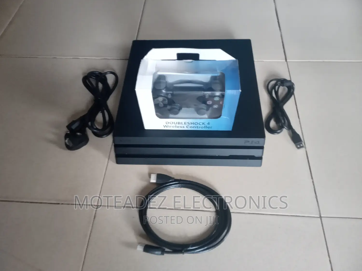 Uk Used Sony Ps4 Pro With Games Installed, 2 Pads and Cables
