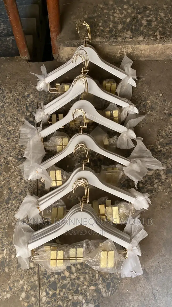 White Luxury Hangers With Pegs.