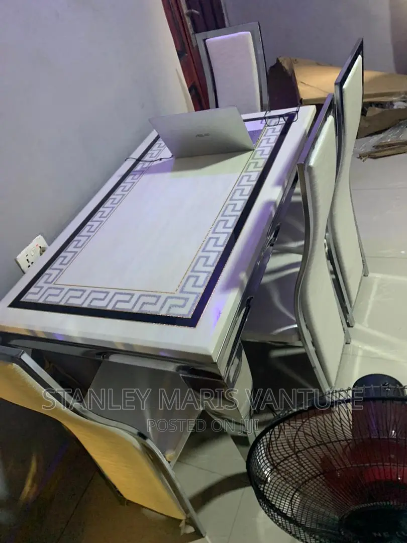 Versace Marble Dinning With Four Leather Seats