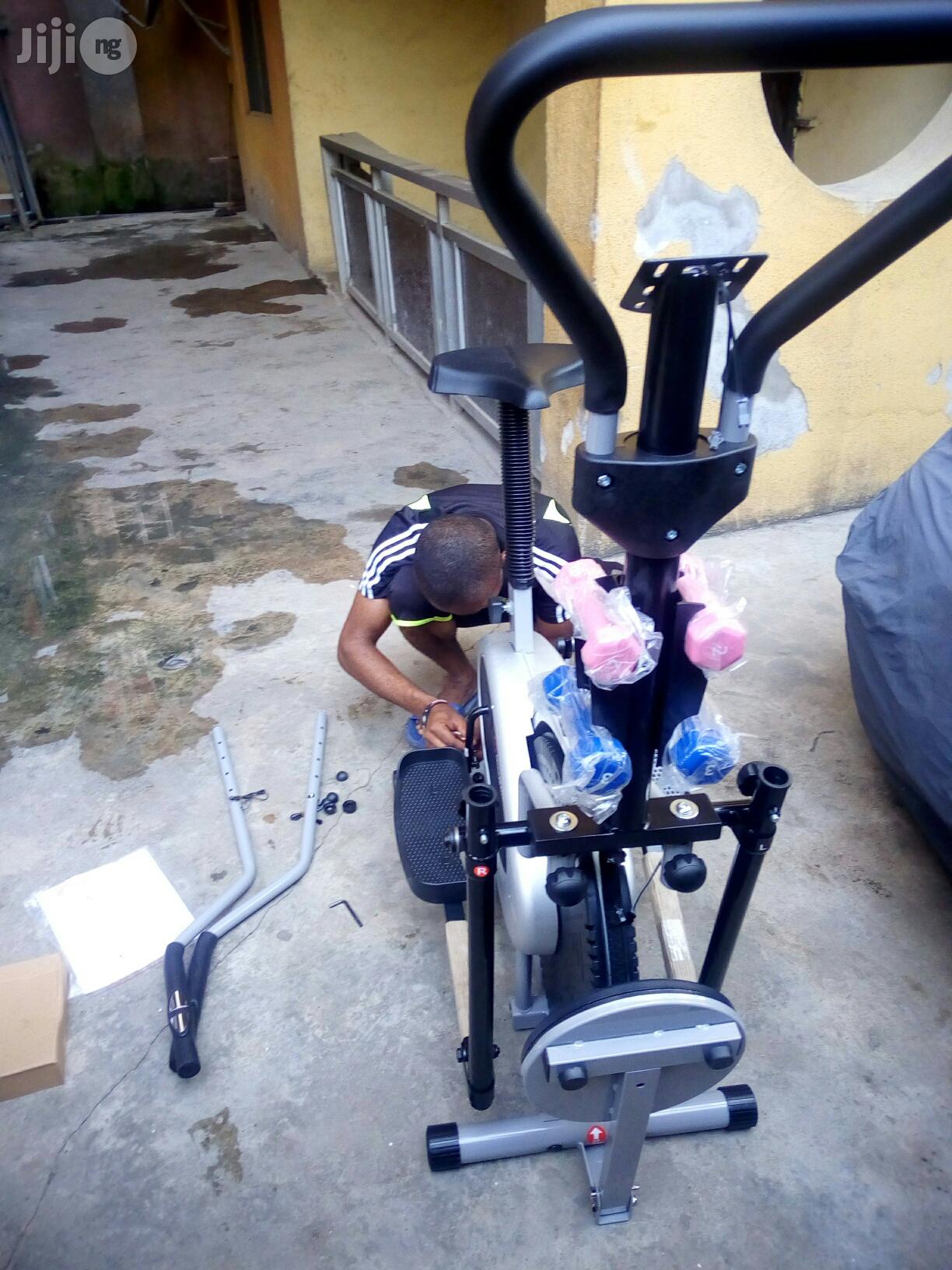 Orbitrack Bike With Twister and Dumbbell