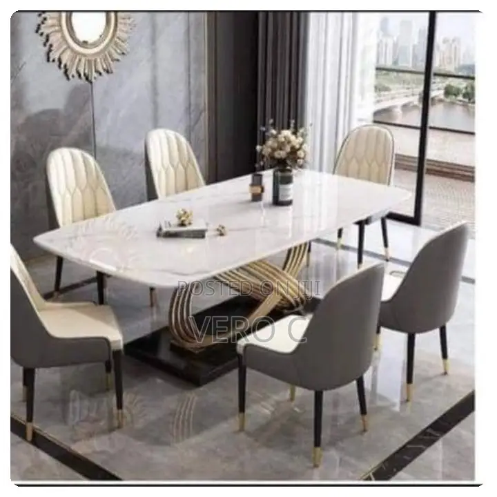 Luxury Marble Top Dining Table and 6 Chairs.