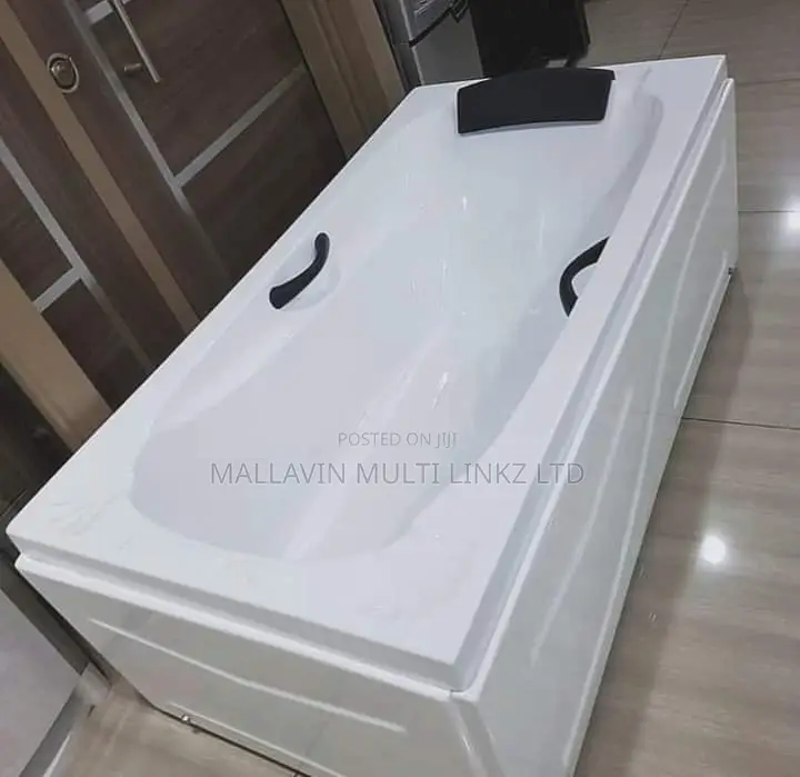 Paneled Bath Tub With Headrest And Side Handles.