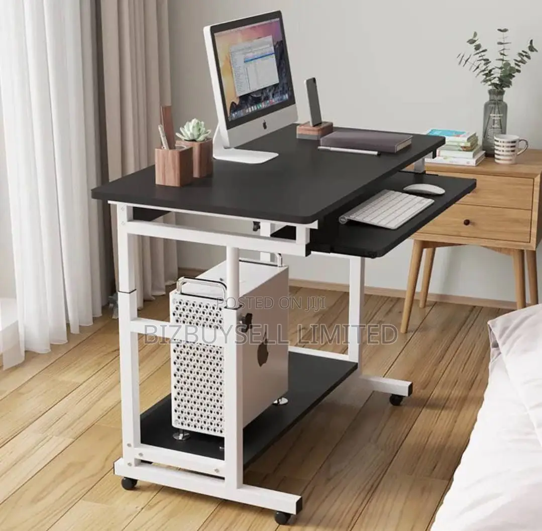 Adjustable Computer Table With Key Board Roller.