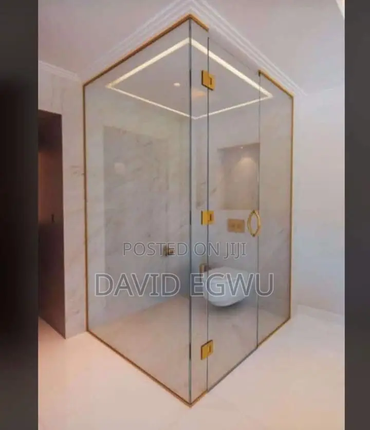 Shower Cubicle With Gold Accessories