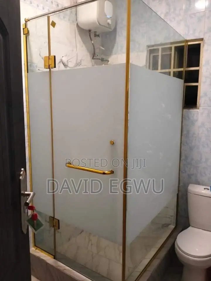 Shower Cubicle With Gold Accessories