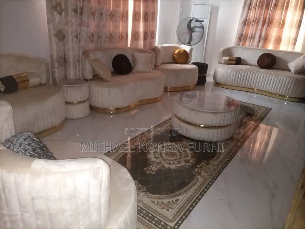Set of Luxurious Sofa With Puff and Center Table