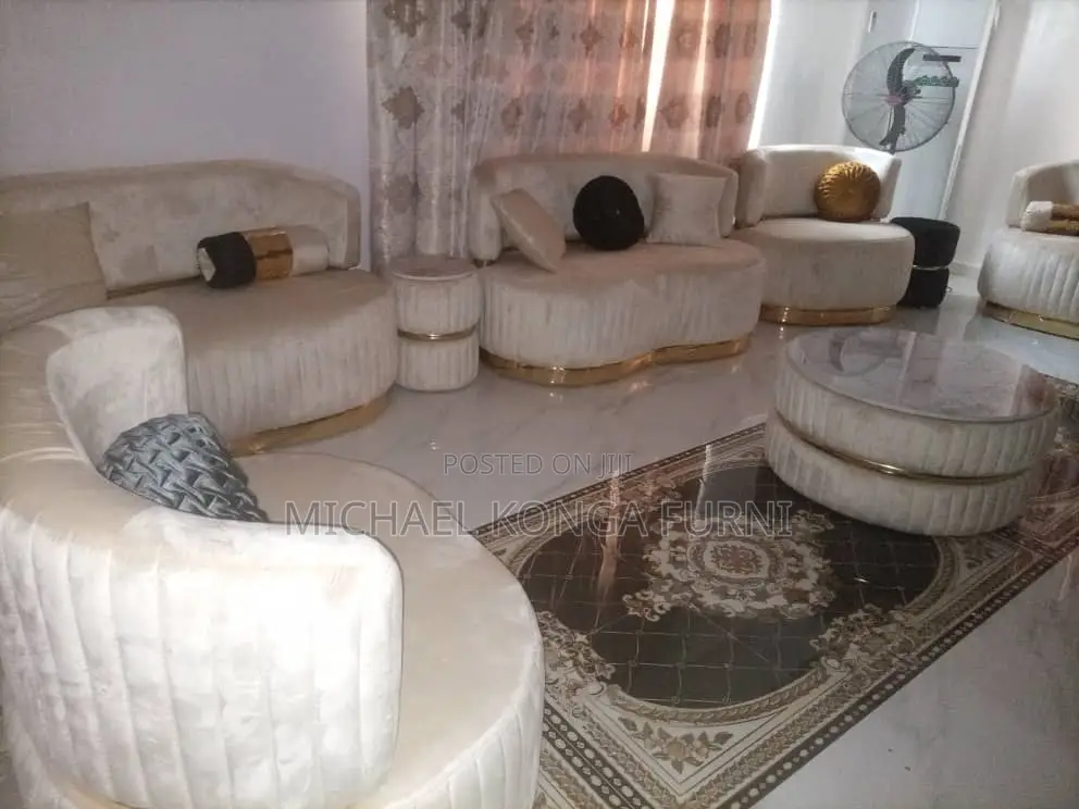 Set of Luxurious Sofa With Puff and Center Table