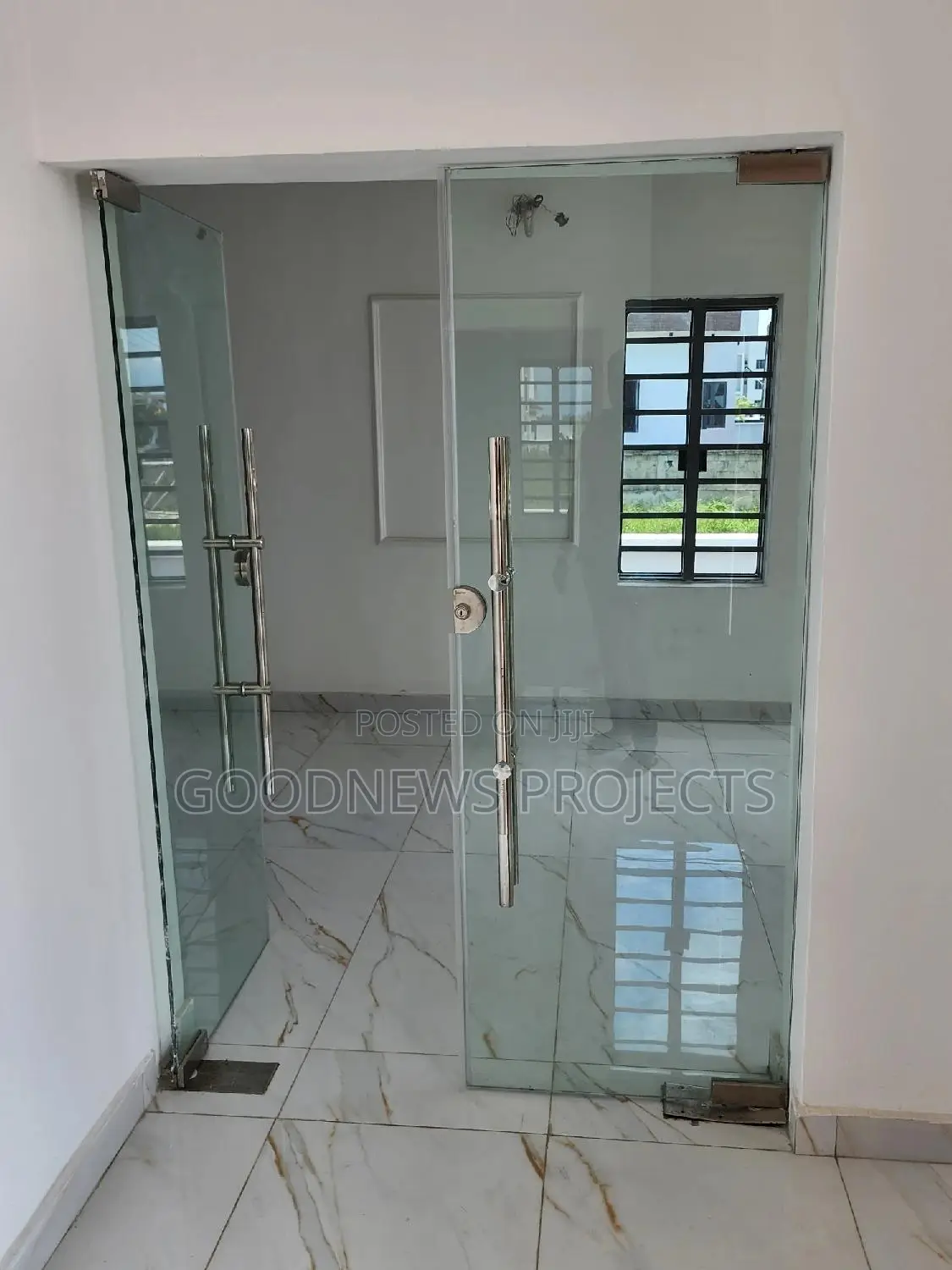 Ante Room Clear Swing Glass Door