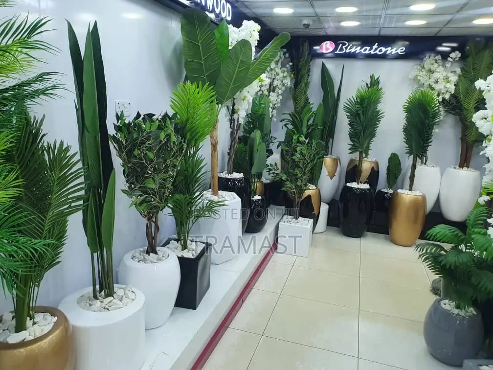 Artificial Flowers and Fiber Glass Pot