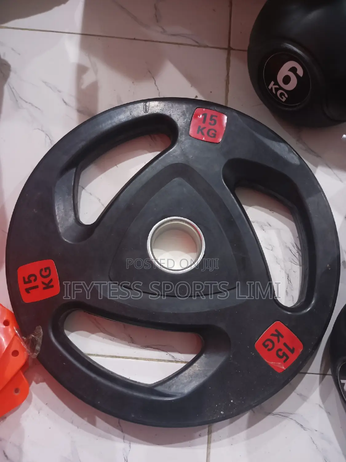 A Pair of 15kg Olympic Weights Plates