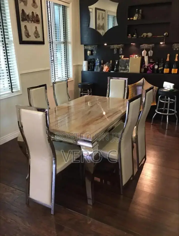 Good Quality Marble Top Dining Table and 6 Chairs.