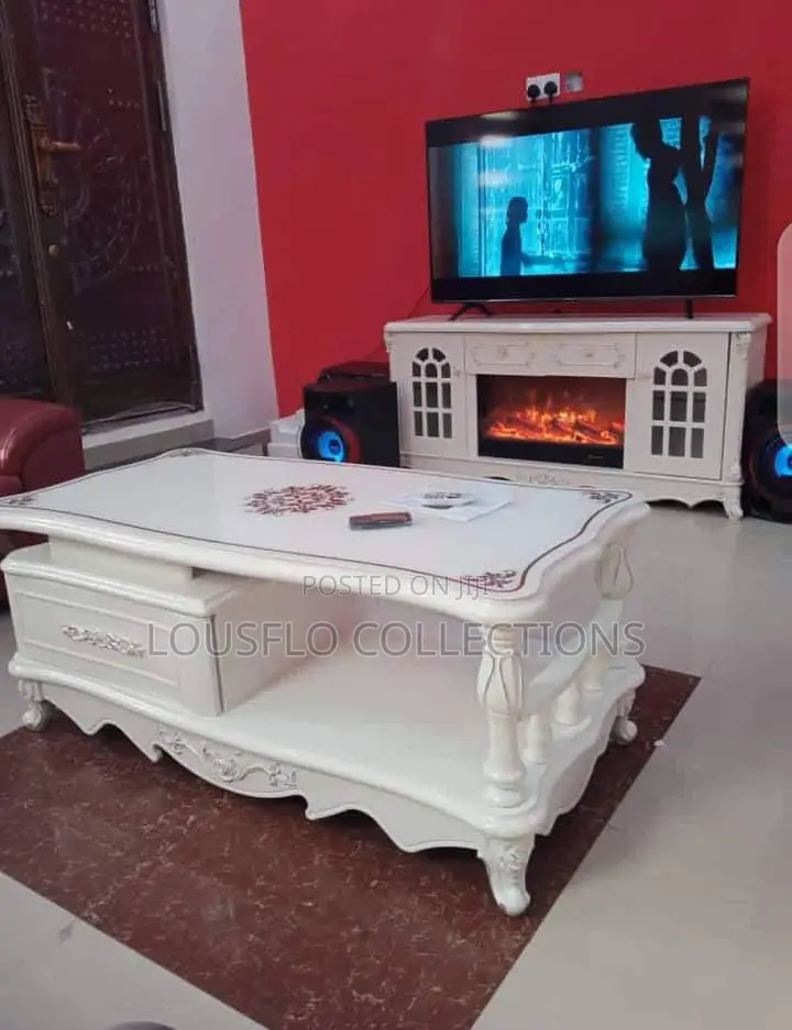 Quality Center Table and Television With Fire  Place
