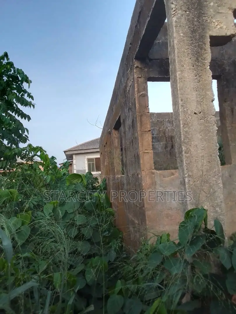 Half Plot of Land in Pankisa Agric With Three Bedroom on It
