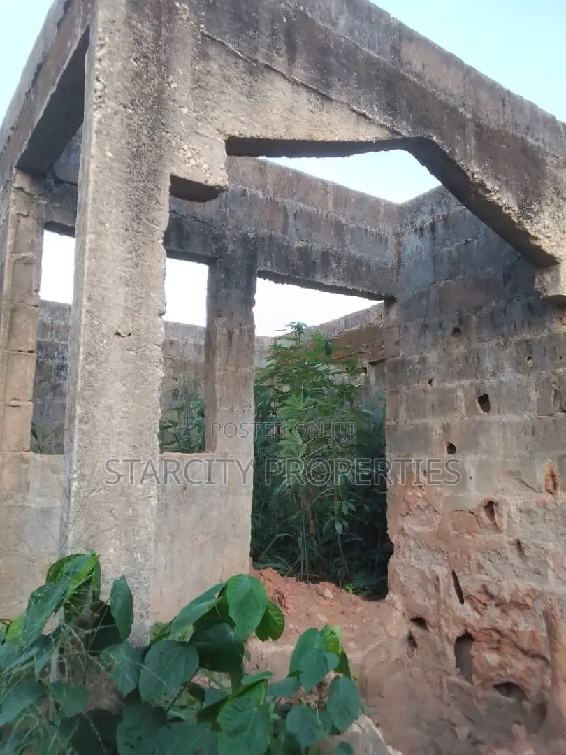 Half Plot of Land in Pankisa Agric With Three Bedroom on It