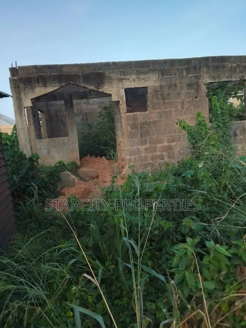 Half Plot of Land in Pankisa Agric With Three Bedroom on It