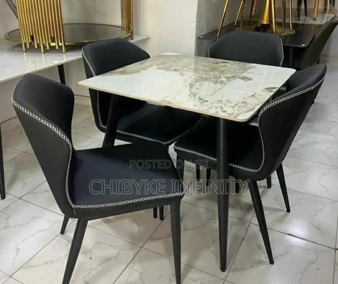 Imported 4 Seater Marble Top Dinning Table With Leather Chai