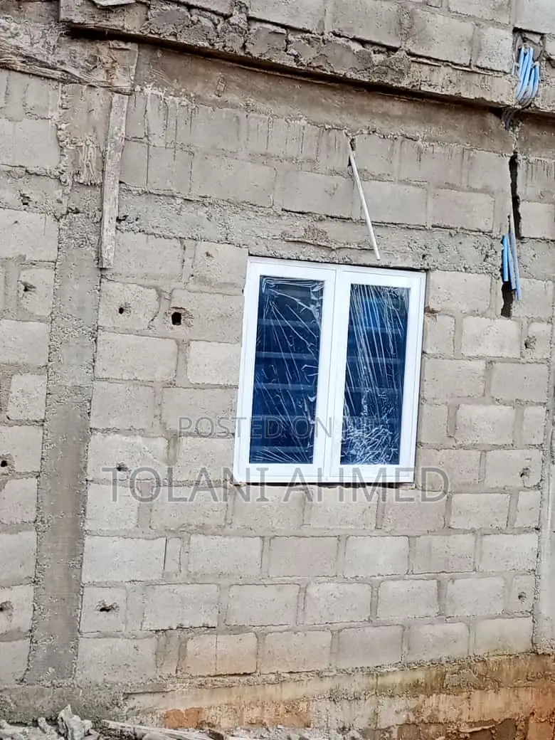 White Casement Window With Burglary and Sliding Net