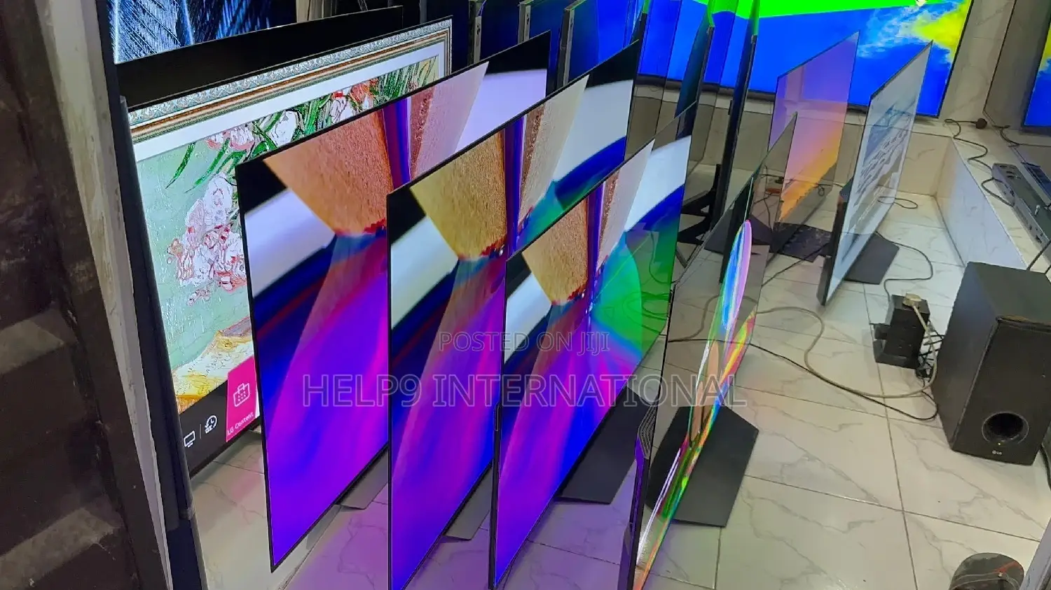 Latest 65" LG OLED Slim Smart TVS Ra