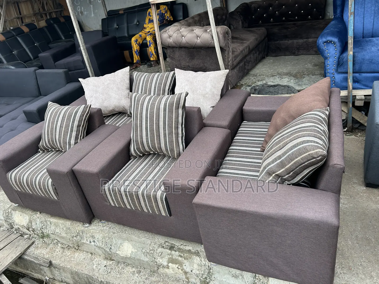 A Standard 7 Seater Brown Sofa
