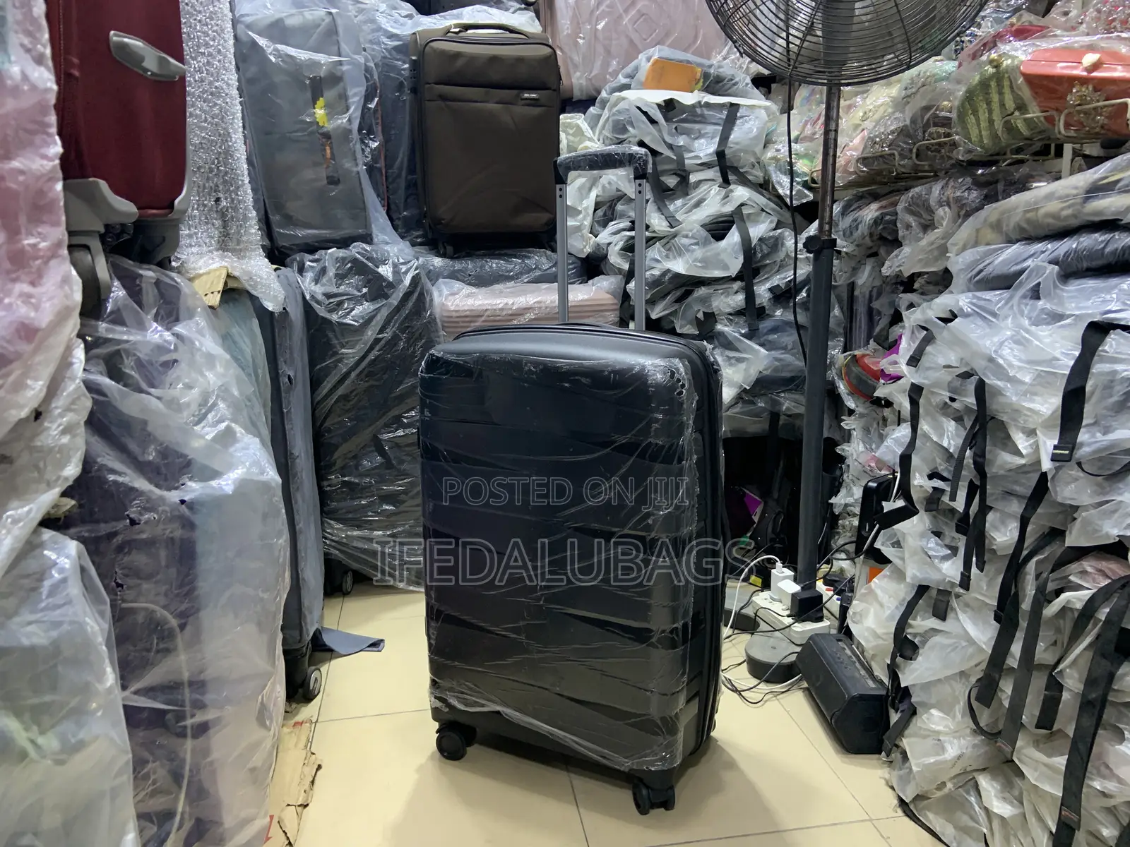 Medium Size Black Unbreakable Travel Luggage