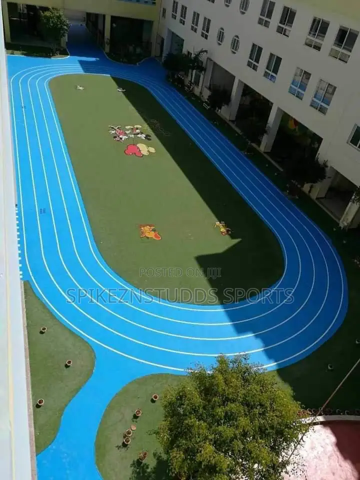 Synthetic Pitch Tartan Track Installation