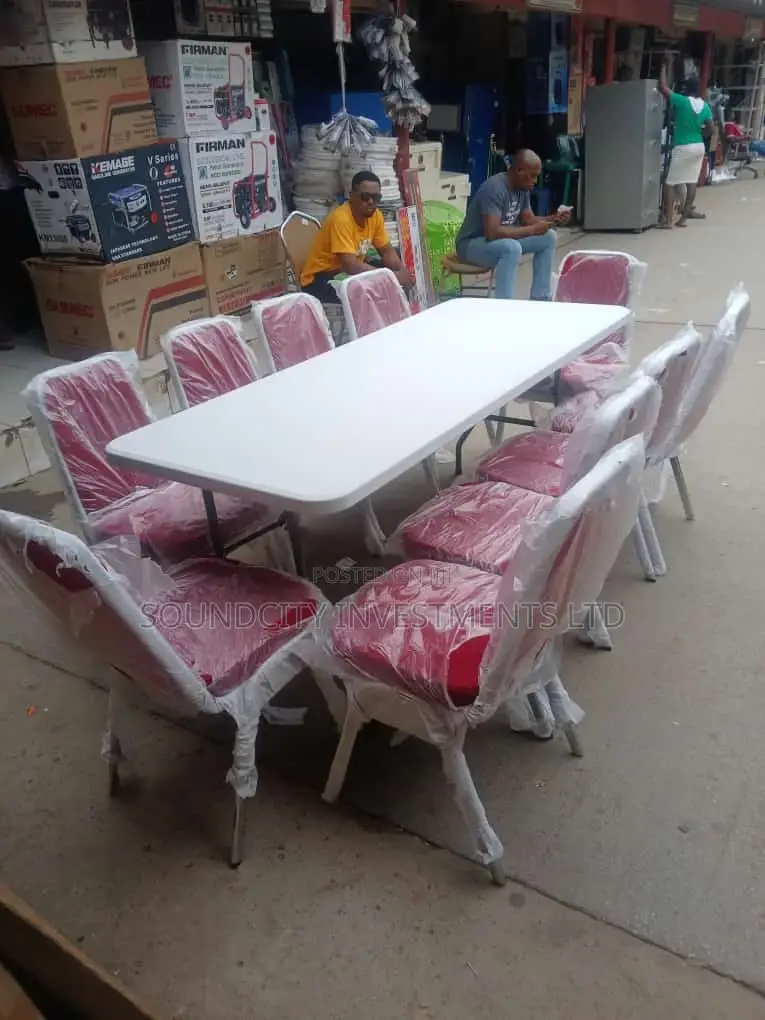 Garden/Lounge Table With Stainless Leg Banquet Chair.