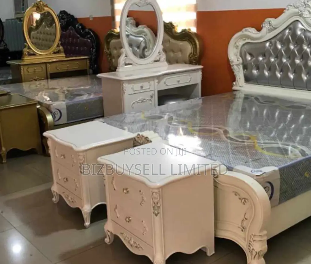 Royal Bed Frame With 2 Sides Drawers and a Dressing Mirror.