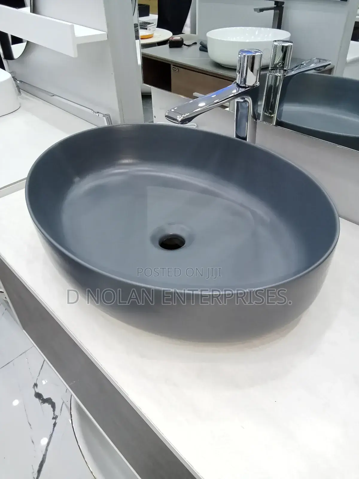 Master Cabinet With Black Counter Top Basin