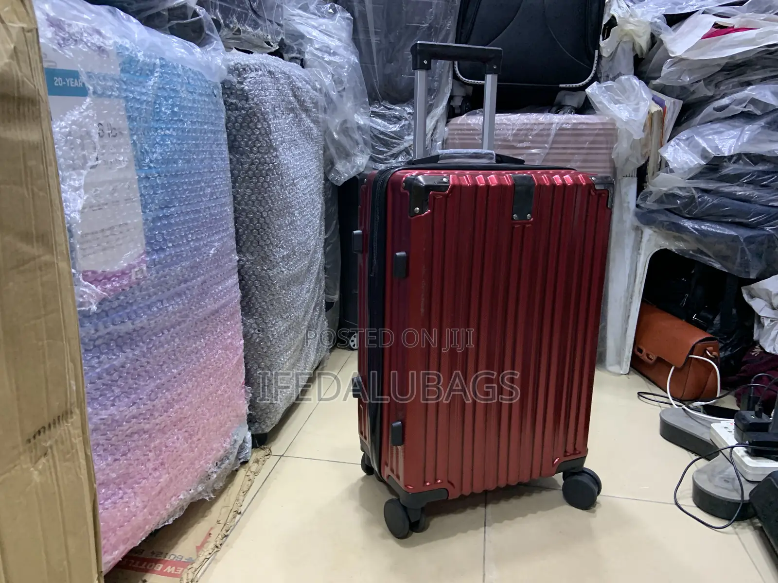 Small Size Red Colour Durable Plastic Travel Luggage