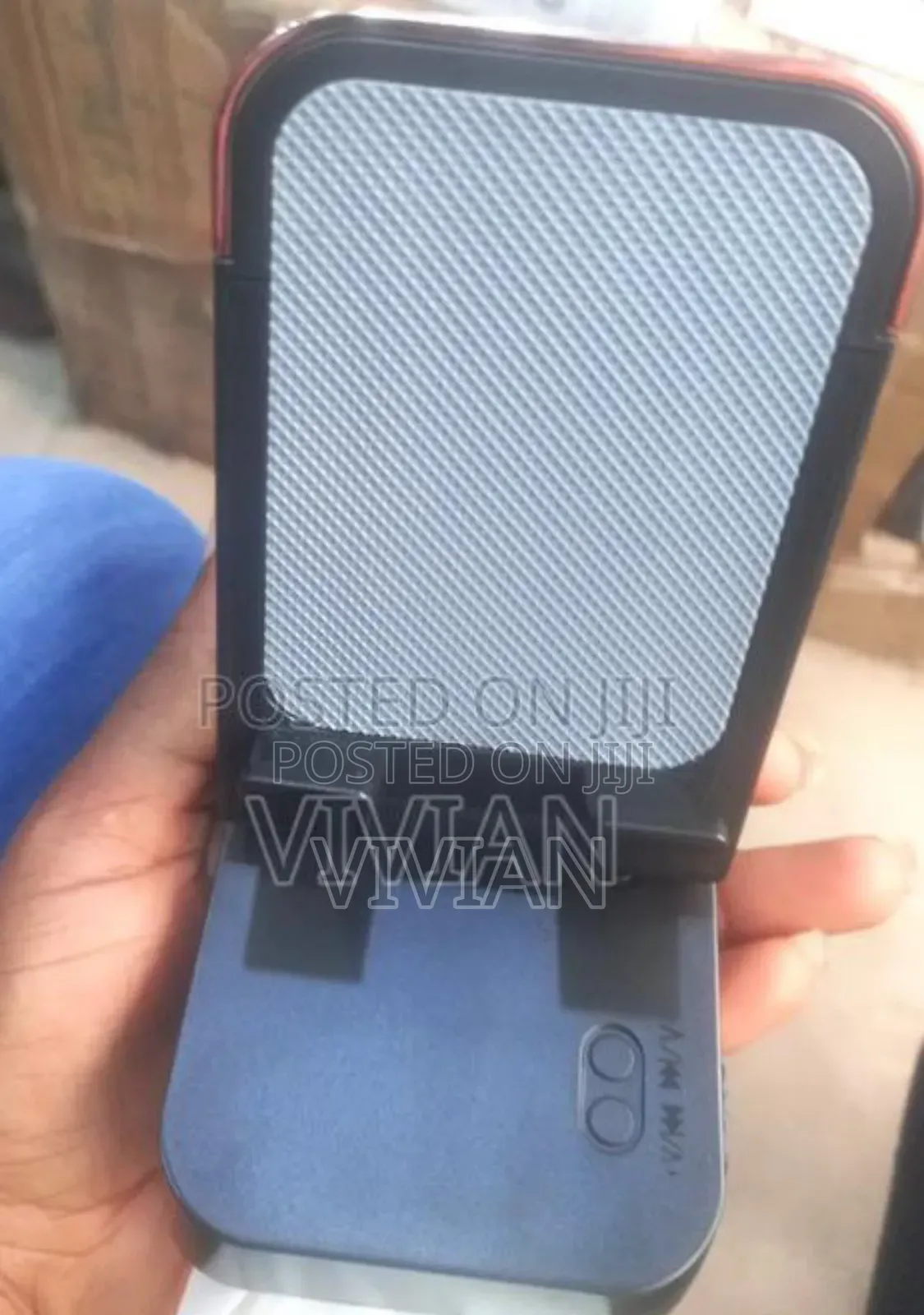 Phone Bracket With Speaker Charging Port