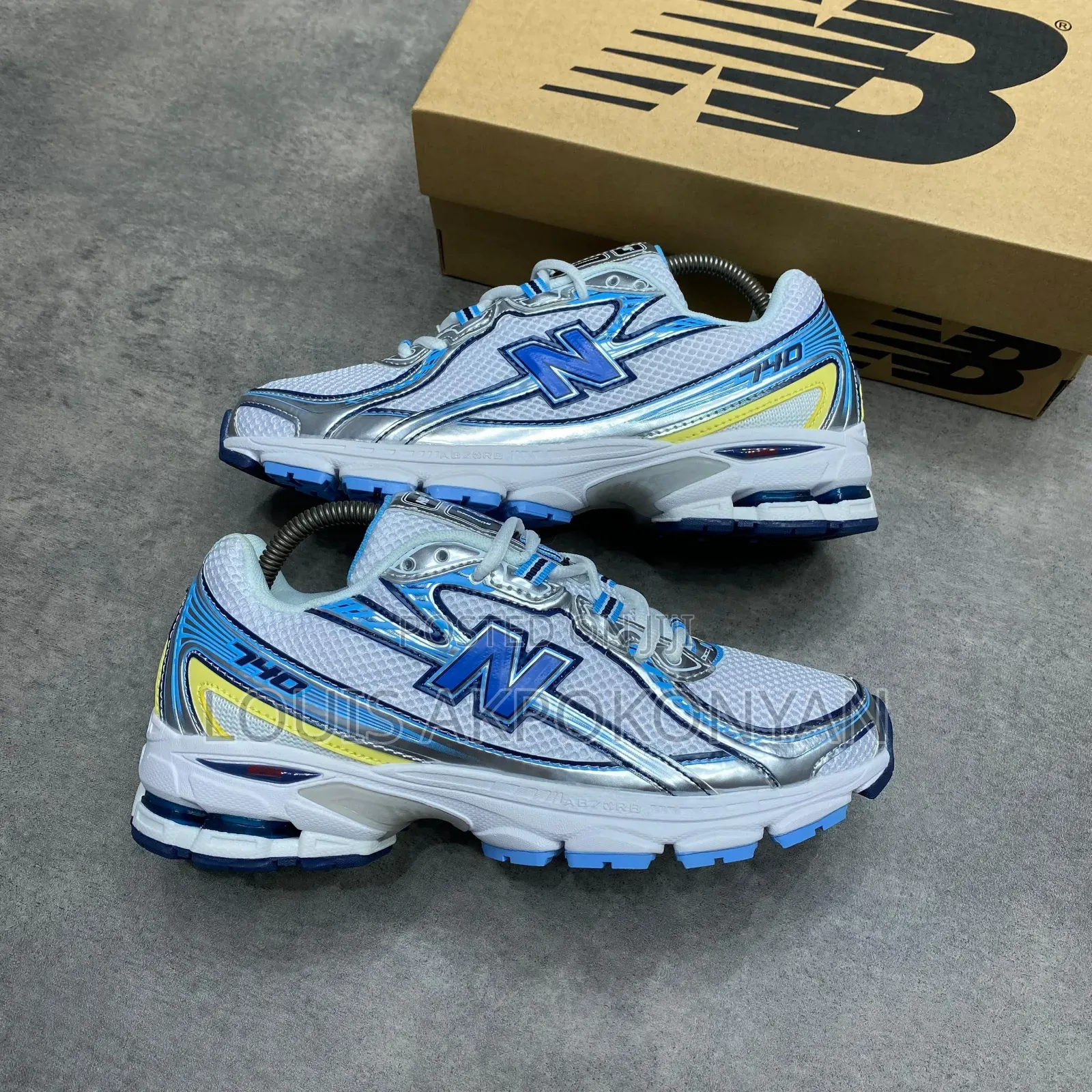 New Balance 740 Vintage White Sneakers