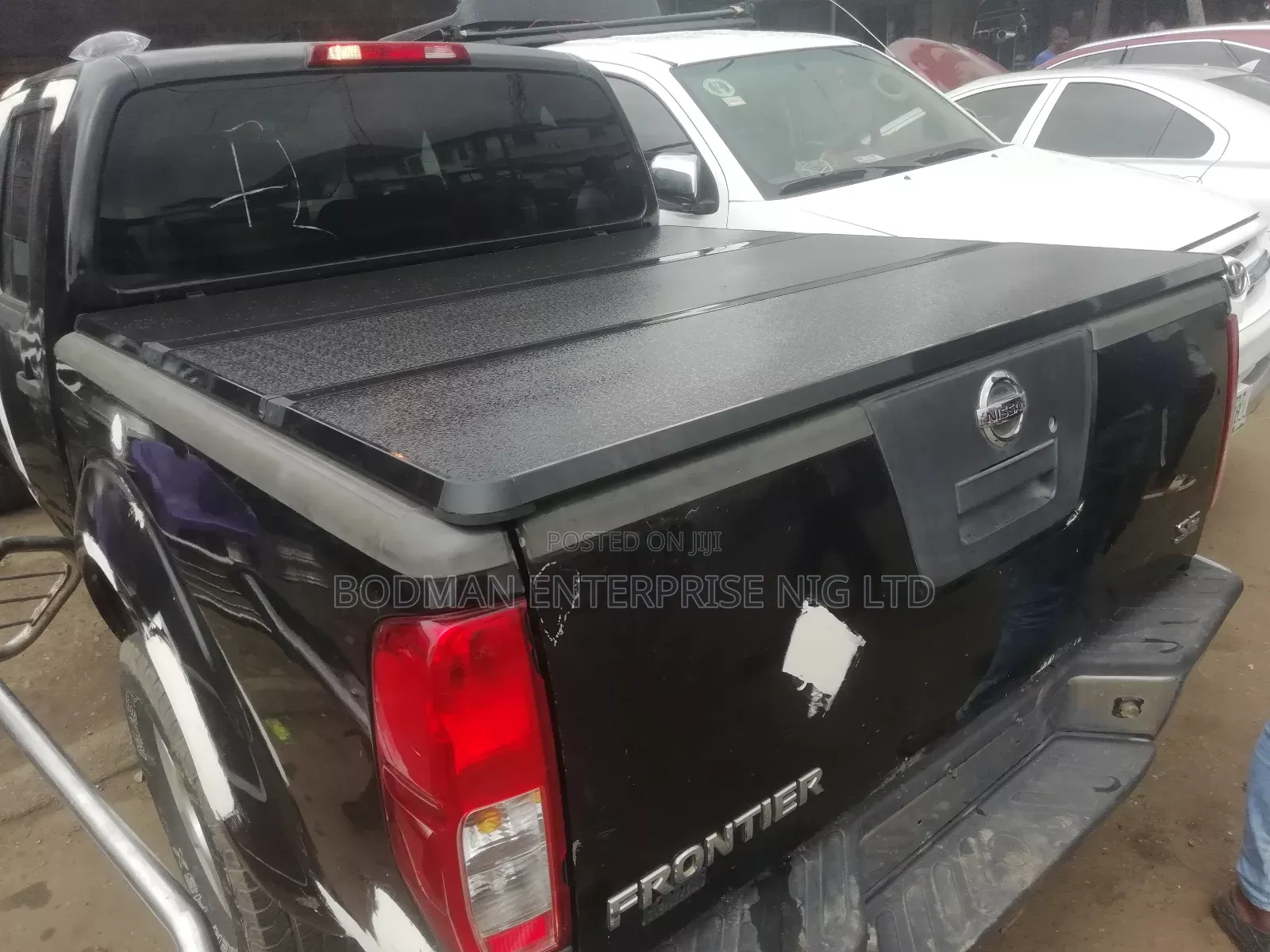 Nissan Frontier Boot Cover Fiber Folding - _%'=