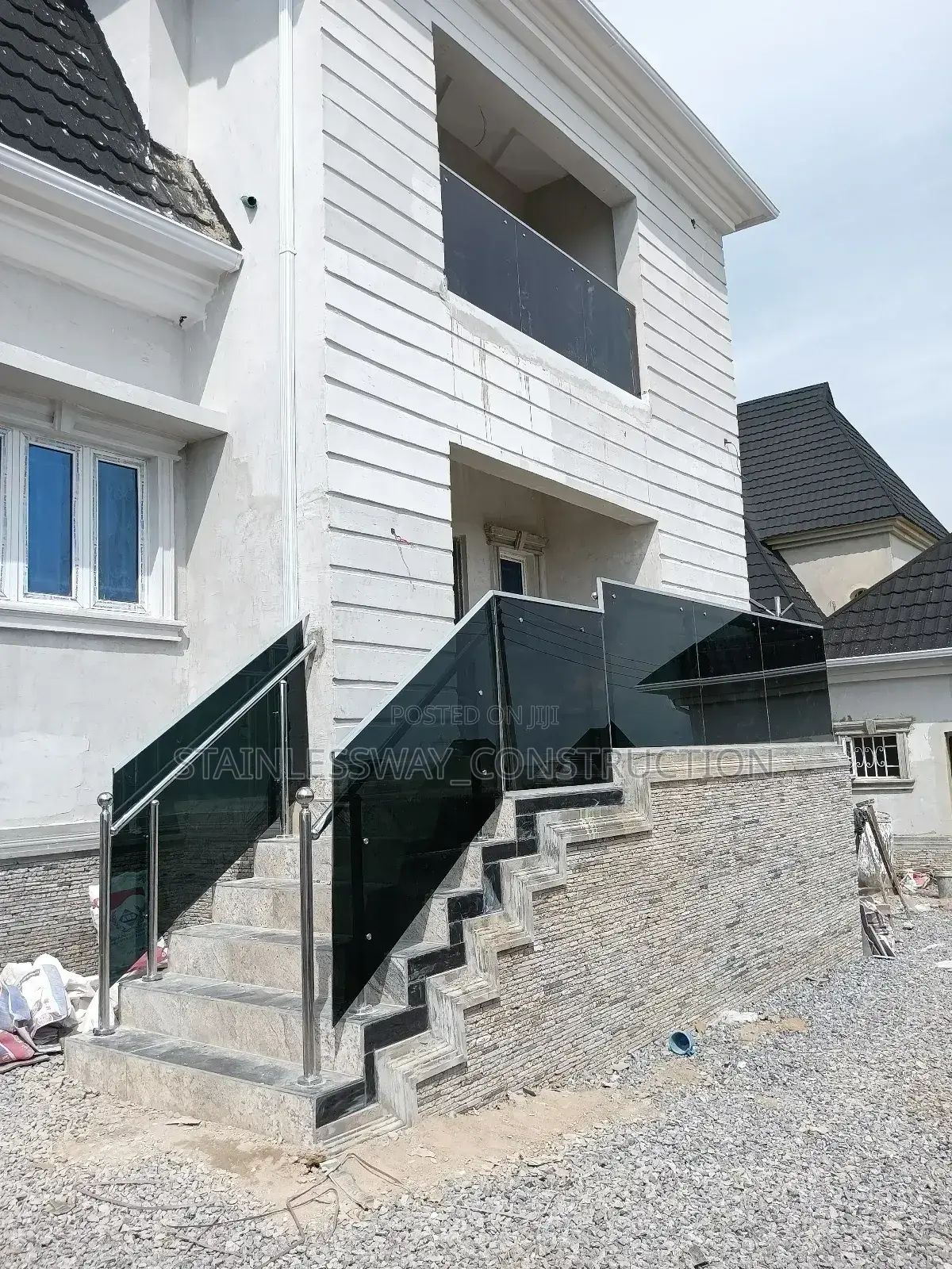 Dark Grey Glass Balcony: Where Shadows Meet Serenity