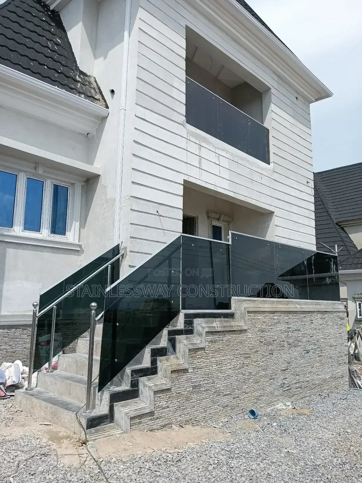Transform Your Balcony With Dark Grey Glass"
