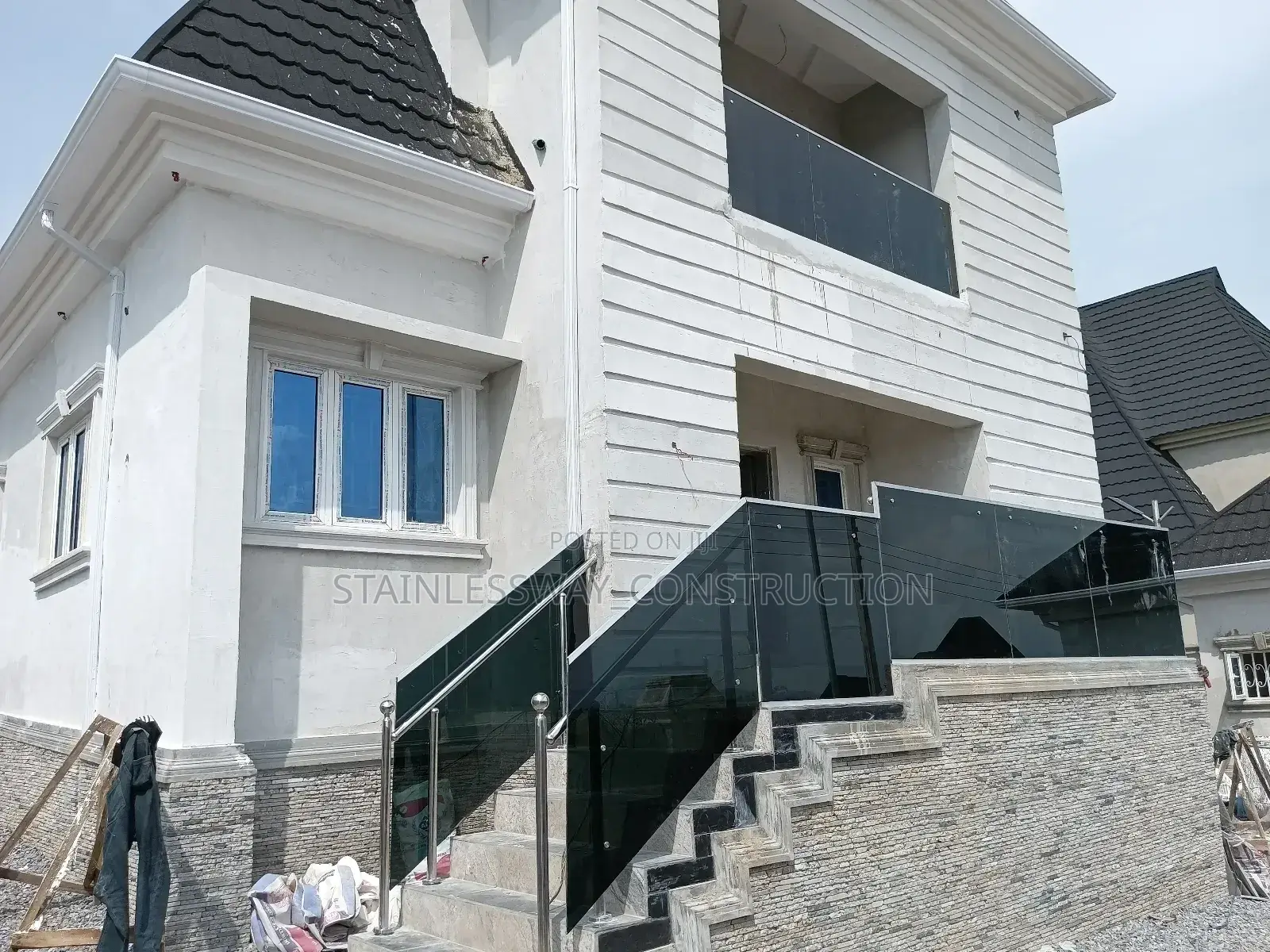 Transform Your Balcony With Dark Grey Glass"