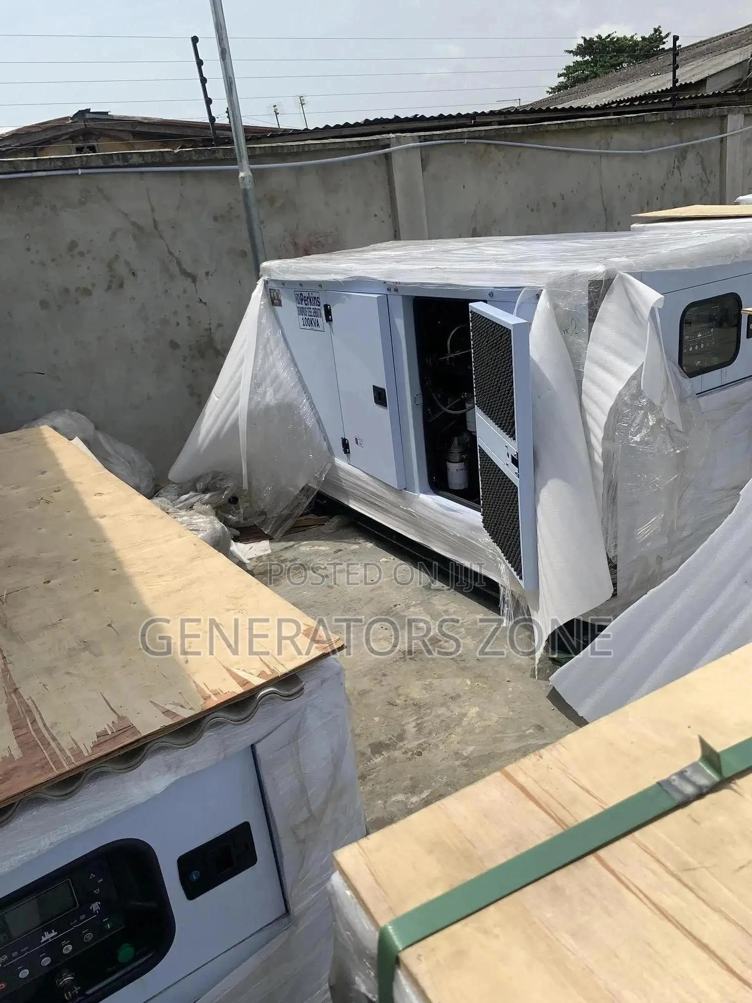 A Perkins 100 "Kilo-Volt-Amperes" Soundproof Generator