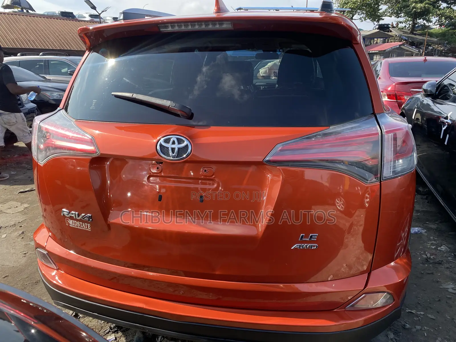 Toyota RAV4 LE AWD (2.5L 4cyl 6A) 2016 Orange