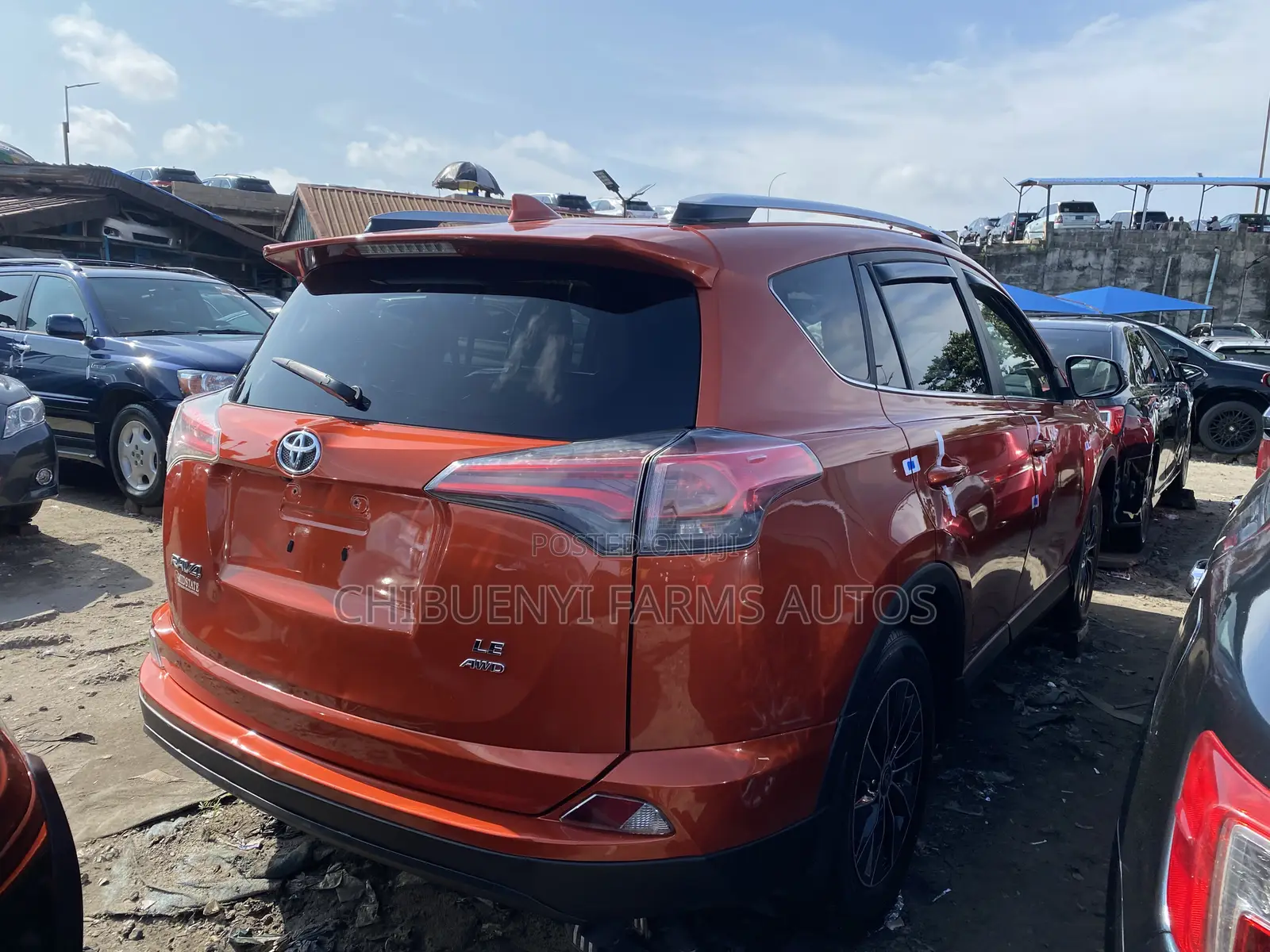 Toyota RAV4 LE AWD (2.5L 4cyl 6A) 2016 Orange