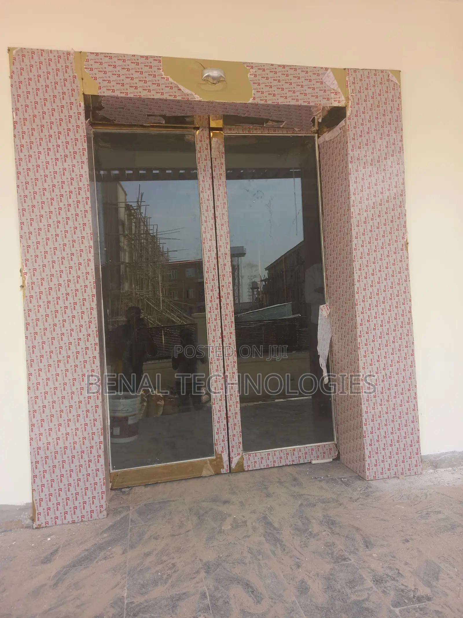 Sensor-Triggered Glass Panel Door