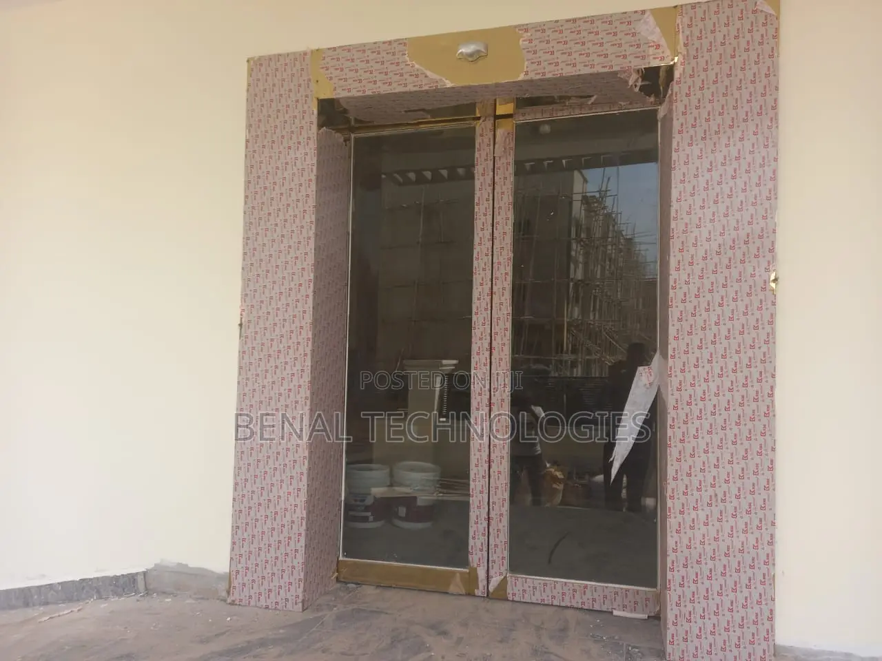 Modern Glass Entrance Powered by Smart Sensors