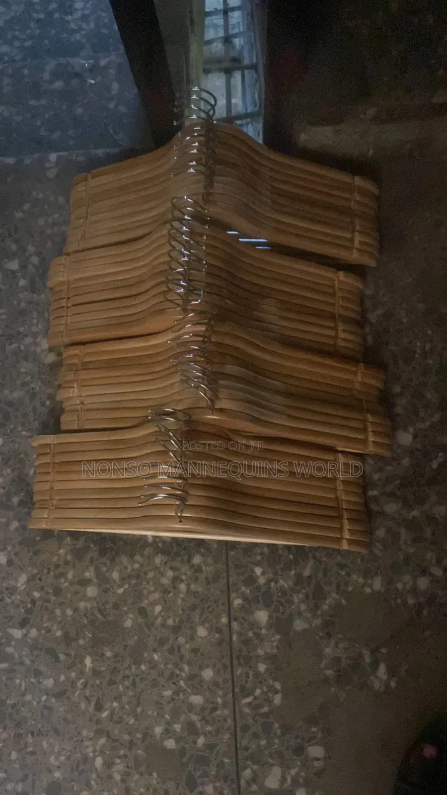 Packs of Neat Wooden Clothes Hangers