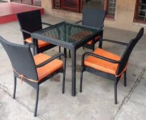 Rattan Chairs and Table With Cushions